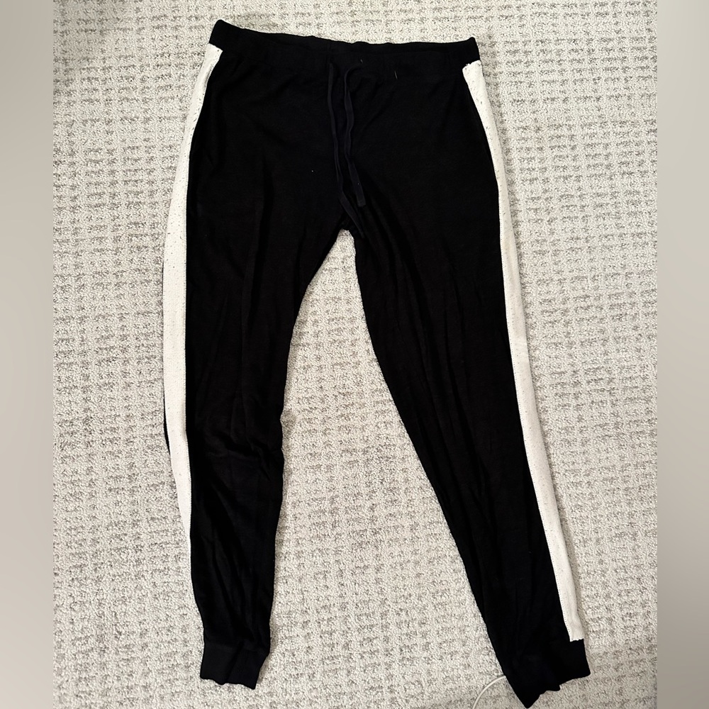Top shop sweatpants, tie at waist, black with white stripe on the side, size 8